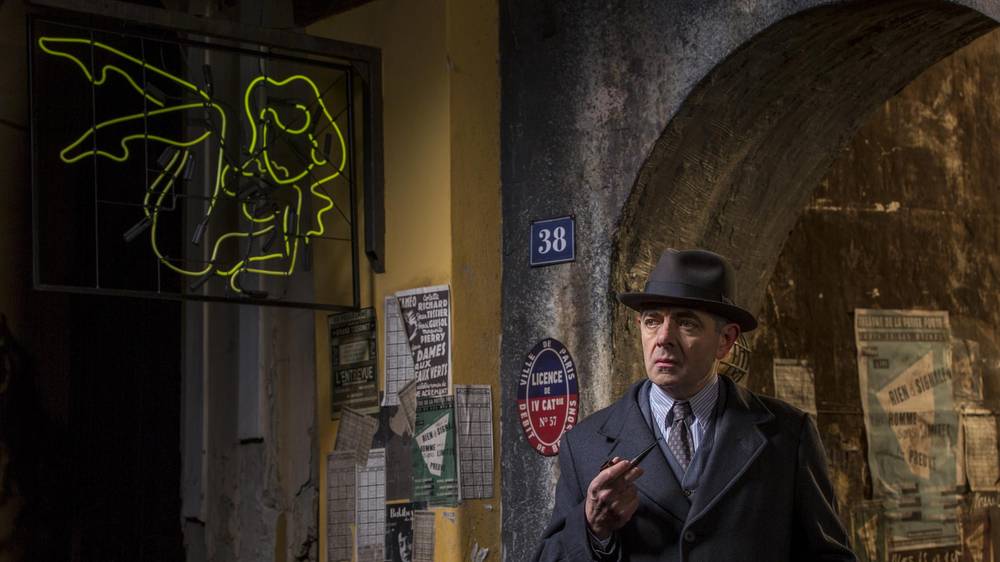Rowan Atkinson as Inspector Maigret